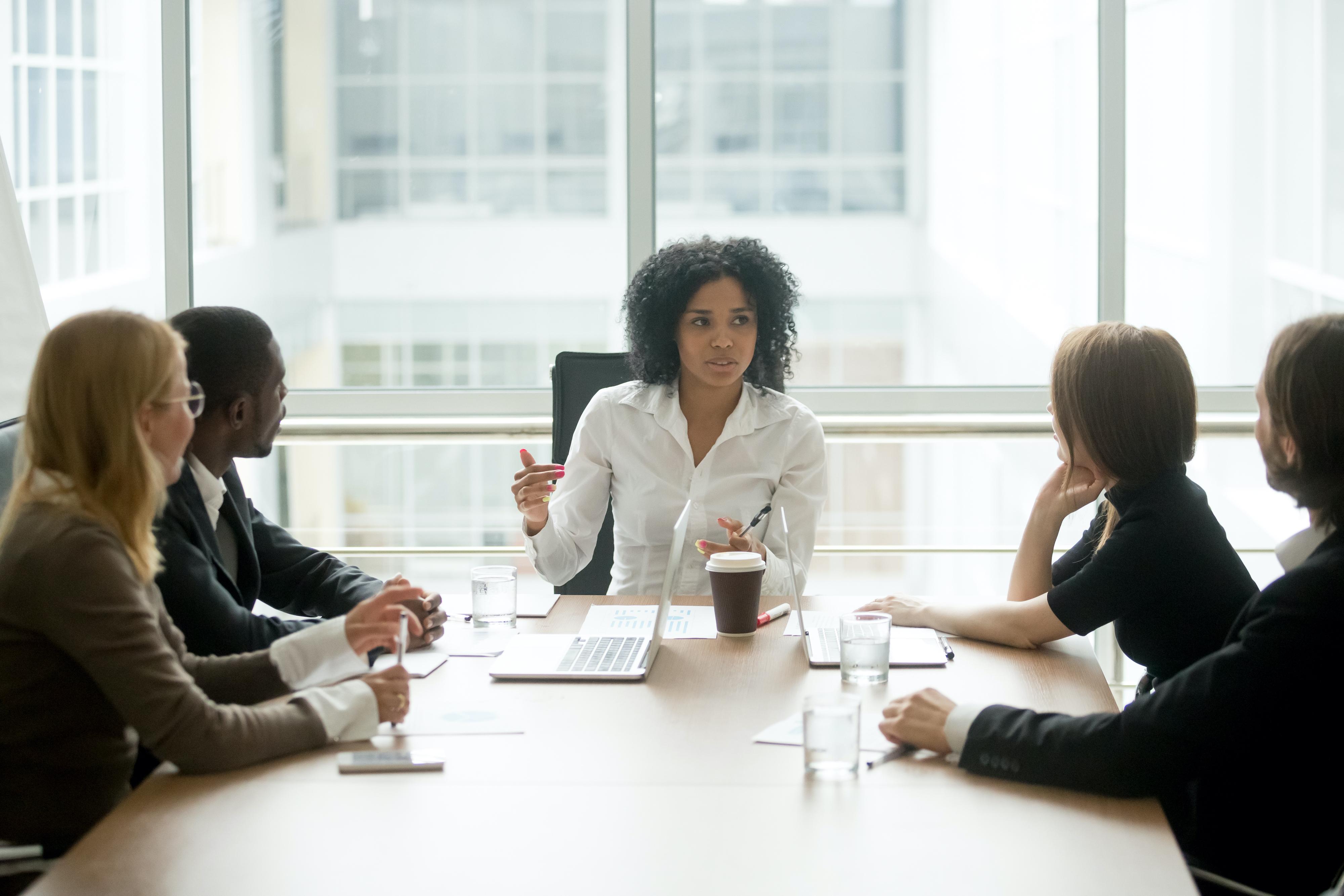 woman talking at meeting